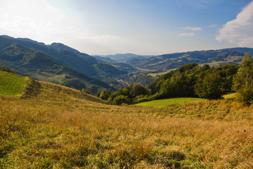Fototapeta na wymiar Beskid Sądecki and village Rytro in summer. View from near village Wola Krogulecka, Poland.