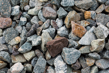 Small road stone background, gravel pebbles stone texture, granite,marble