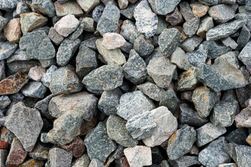 Small road stone background, gravel pebbles stone texture, granite,marble