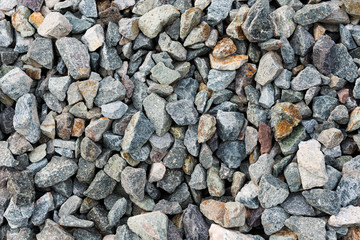 Small road stone background, gravel pebbles stone texture, granite,marble