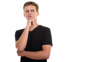 Studio shot of young man isolated against white background