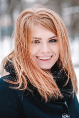 Naklejka premium Plus size model closeup portrait with winter clothes.