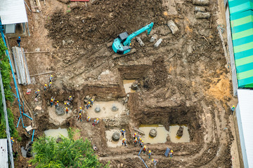 Aerial view of concrete bored pile foundation work on a construction site. 