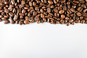 flame with coffee beans on white background