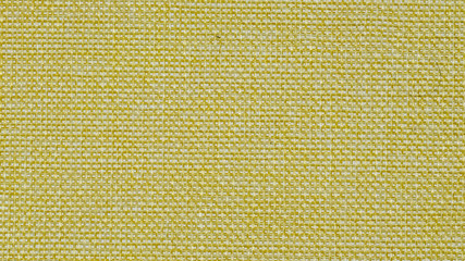 Hessian sackcloth burlap woven texture background, Cotton woven fabric close up with flecks of varying colors of beige and brown, with copy space for text decoration.