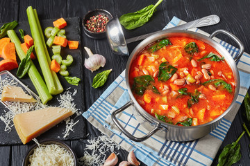 savory italian soup of cranberry beans in a pan