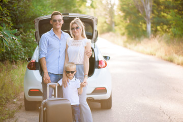 Summer day and car trip. Young family travel.