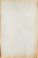 sheet of old blank yellowed paper with crumpled edges - paper texture background