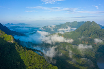 Aerial view of mountains in Nong Khiaw. North Laos. Southeast Asia. Photo made by drone from above. Bird eye view.