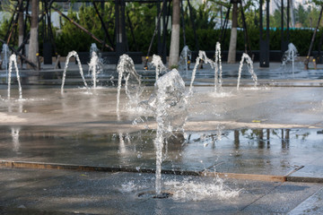 Close-up of an outdoor fountain and marble pool