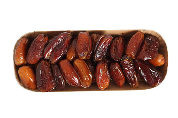 Dry dates in box. Isolated with clipping path. Directly Above.