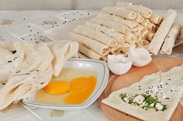 Pastries made from dough, cheese and eggs