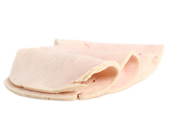 Chicken ham slices. Isolated on a white background.