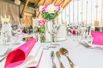 Beautiful table set for some festive event, party or wedding reception. Design, formal. Closeup