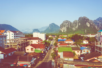 Aerial view of village at Vang Vieng , Laos. Southeast Asia. Photo made by drone from above. Bird eye view.