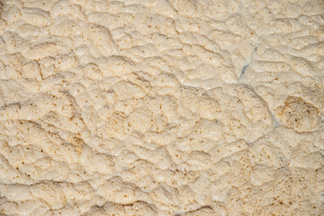 Background of yellow foam on the water