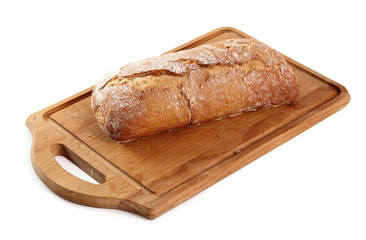 Loaf of rye bread on cutting board. Isolated with clipping path.