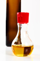 Olive Oil Cruet with Oil. Isolated with a white background.