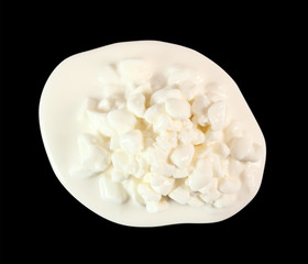 Cottage Cheese. Isolated on black background with clipping path. Directly Above.