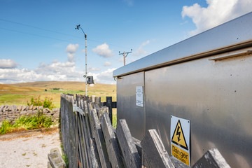 Shallow focus of an electrical power generator and transformer seen within a North Yorks railway...
