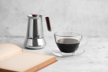 Coffee in cup and books on rustic table with a blank space for a text, Espresso in cup on white background