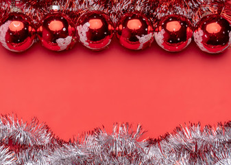 Christmas balls on red background card