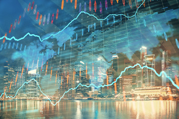 Financial chart on city scape with tall buildings background multi exposure. Analysis concept.