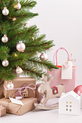 Decorated christmas tree with wrapped gifts. Christmas and new year celebration concept