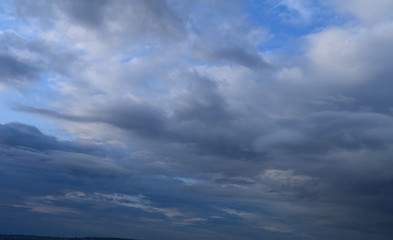 Heavy rain clouds. Photography, atmospheric phenomena, panoramic image of the autumn sky.