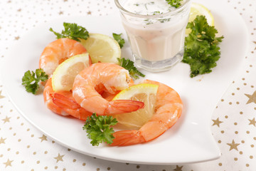 festive appetizer, shrimp with sauce and herbs
