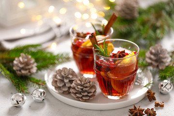 Christmas mulled wine. Traditional Xmas festive drink with decorations and fir tree