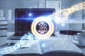 Multi exposure of blockchain theme hologram and table with computer background. Concept of bitcoin crypto currency.
