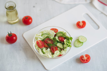 Healthy lifestyle, diet concept. Doing fresh green salad