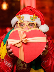 Kindness and generosity. Giving gift. Delivery service. Gift shop. December sale. Christmas gift. Spread love. Surprise concept. Man senior Santa claus hold gift box. Winter ideas. Celebrate new year