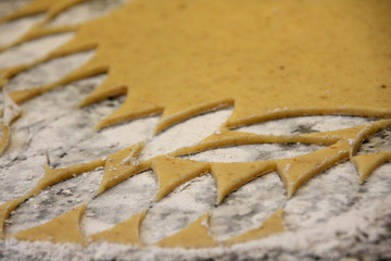 Cut out christmas cookies from raw pastry dough shortcrust baking cookies