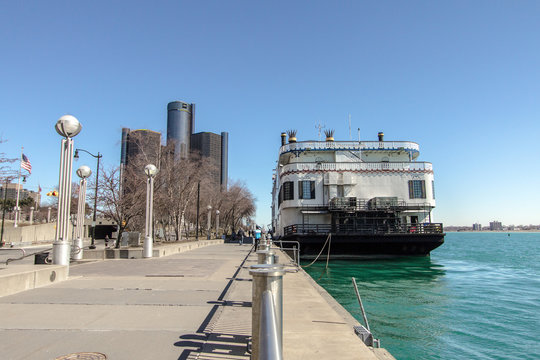 Detroit, Michigan, USA - March 18, 2018: Downtown waterfront district of Detroit with the landmark Renaissance Center building and the Detroit Princess riverboat docked on the Detroit River