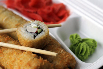 Salmon sushi rolls so close, hot japanese food