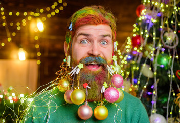 New year fashion clothes. Christmas beard decorations. Santa Claus wishes Merry Christmas. Christmas celebration holiday. Theme Christmas holidays and new year. Funny bearded man in festive concept.