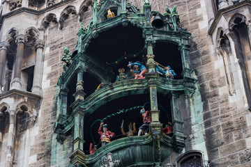 Naklejka premium Elements of architecture and statues of the new city hall on Marienplatz in the center of Munich. 