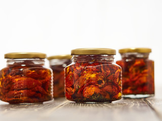 Canned sun dried red cherry tomatoes.