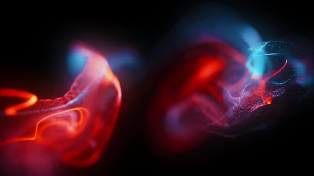 4k  Fluid particles. Liquid glowing multicolor neon dust. Fluid animation. Abstract background