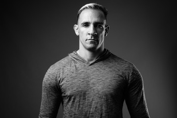 Studio shot of muscular man in black and white