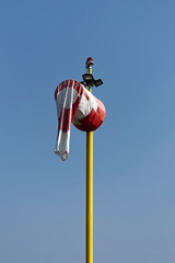windsock on the yellow pole
