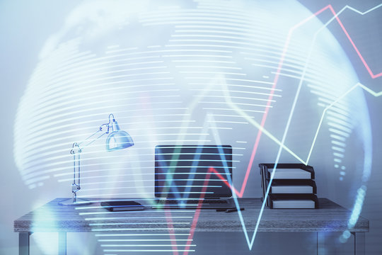 Stock market chart with globe hologram and desktop office computer background. Multi exposure. Concept of financial analysis.