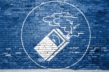 Mandatory signs pictogram Use gas detector (in german Gebotszeichen, Gasdetektor benutzen) Graffiti on Brick Wall