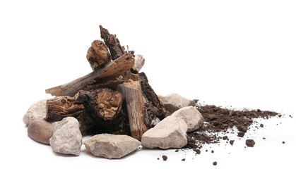 Decorative dry rotten branches in soil, dirt pile with rocks, wood for campfire isolated on white background - obrazy, fototapety, plakaty