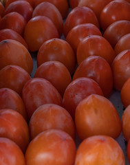 Persimmons as background and texture