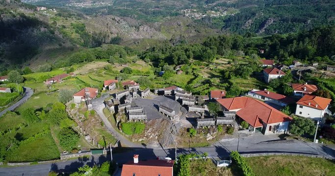 Aerial revealing view of the granaries (espigueiros) in the historic village of Soajo, Portugal.