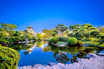 Beautiful Osaka castle Night scape / Japanese garden / 夜の水辺に映る大阪城 / 日本庭園 / 公園 / 石垣