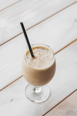 cup of Frappuccino on table